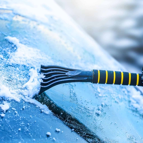 Scraping a windshield